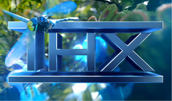 The THX logo with a dragonfly flying above it