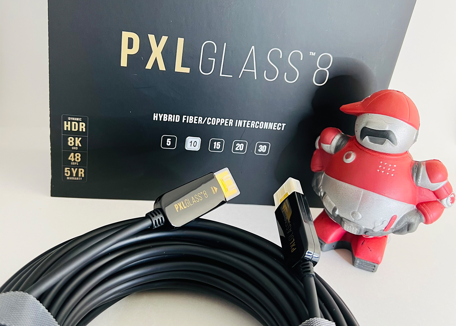 PixelGen cables and box with a TEX doll