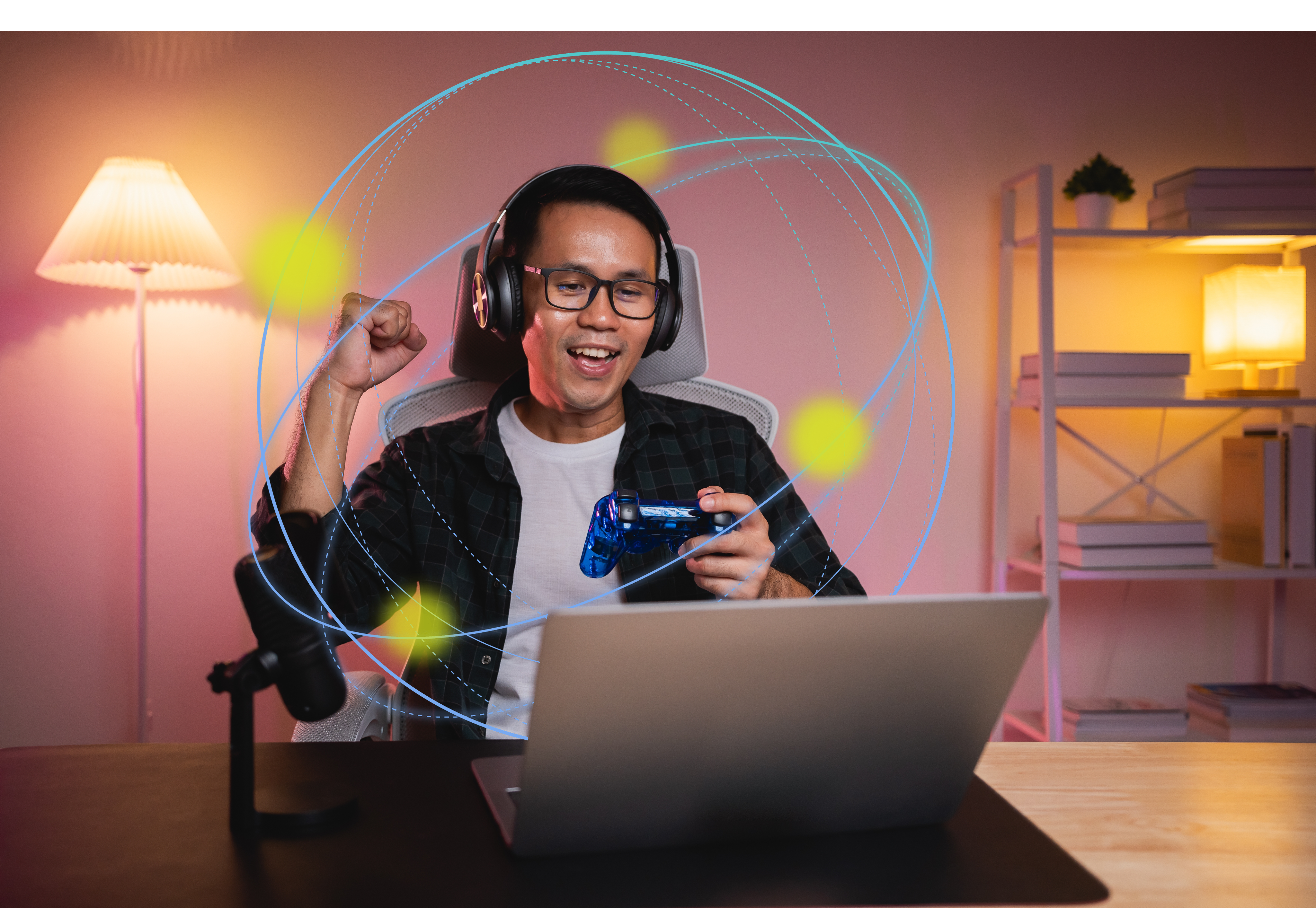 Man at laptop with headset